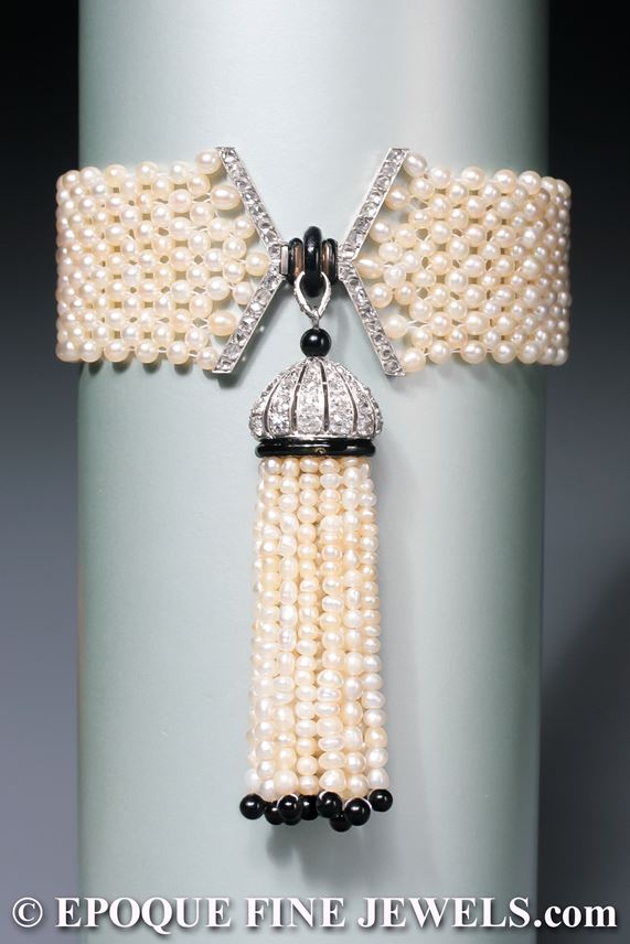   Mauboussin - An early Art Deco natural pearl, enamel, onyx and diamond tassel bracelet | MasterArt